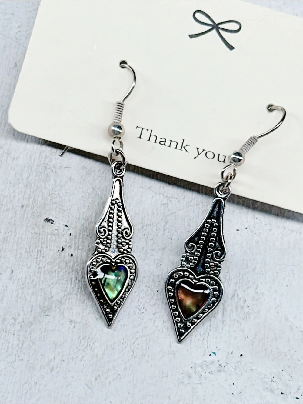 327u. Shell Silvertone Earrings